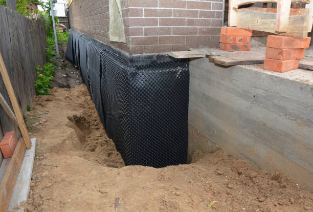 SJ Waterproofing Pros technician performing targeted Exterior Waterproofing assessment in Leesburg, IN
